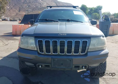 2003 Jeep Grand Cherokee Overland из США, поврежденный, VIN 1J8GW68J13C545620